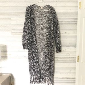 Long sweater with fringe